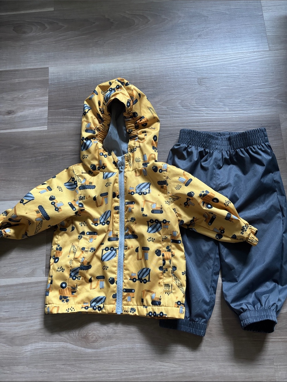 Yellow Construction Print Rain Jacket and Gray Rain Pants